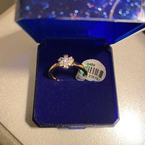1/4 ct gold plated flower ring size 7.